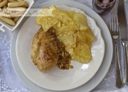 Receta de pollo encebollado en salsa de piñones